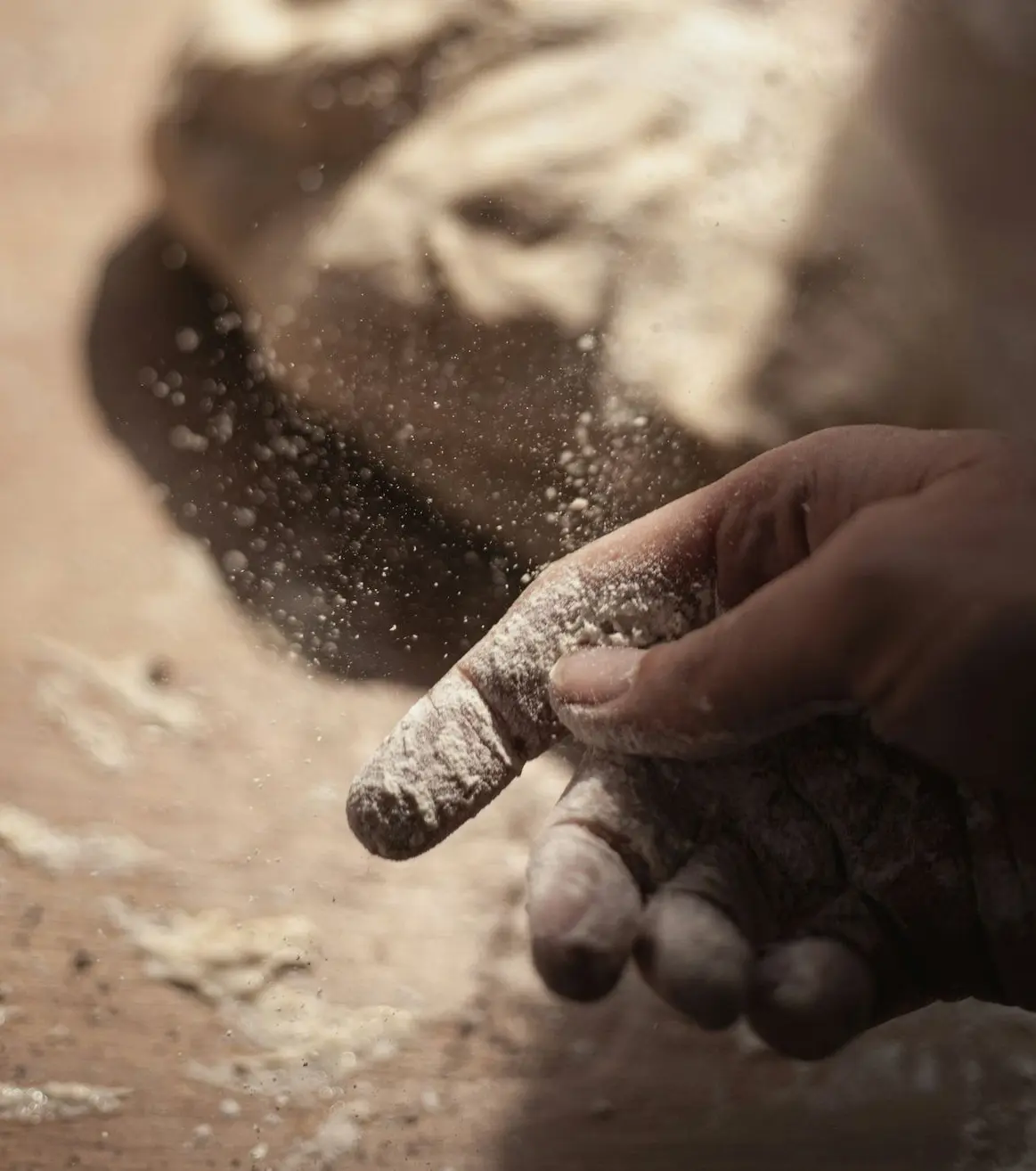 persons hand with white powder